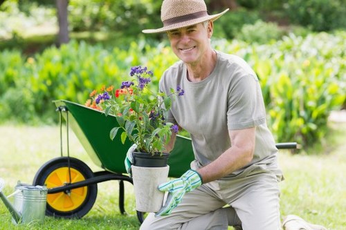 North End gardeners pruning shrubs and shaping borders
